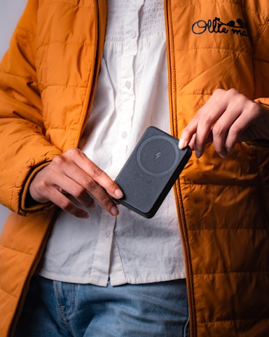 Phone on stand with blue case