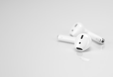 White wireless earbuds